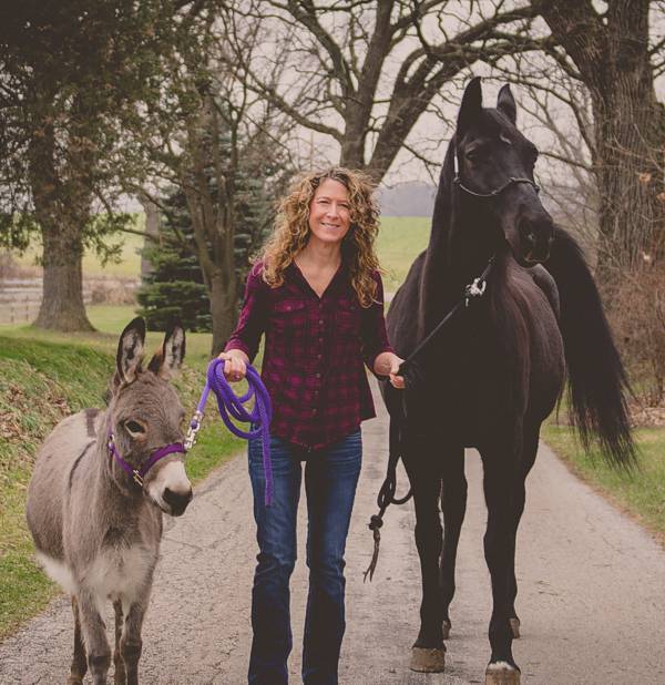Tina Euteneier with her horse and donkey